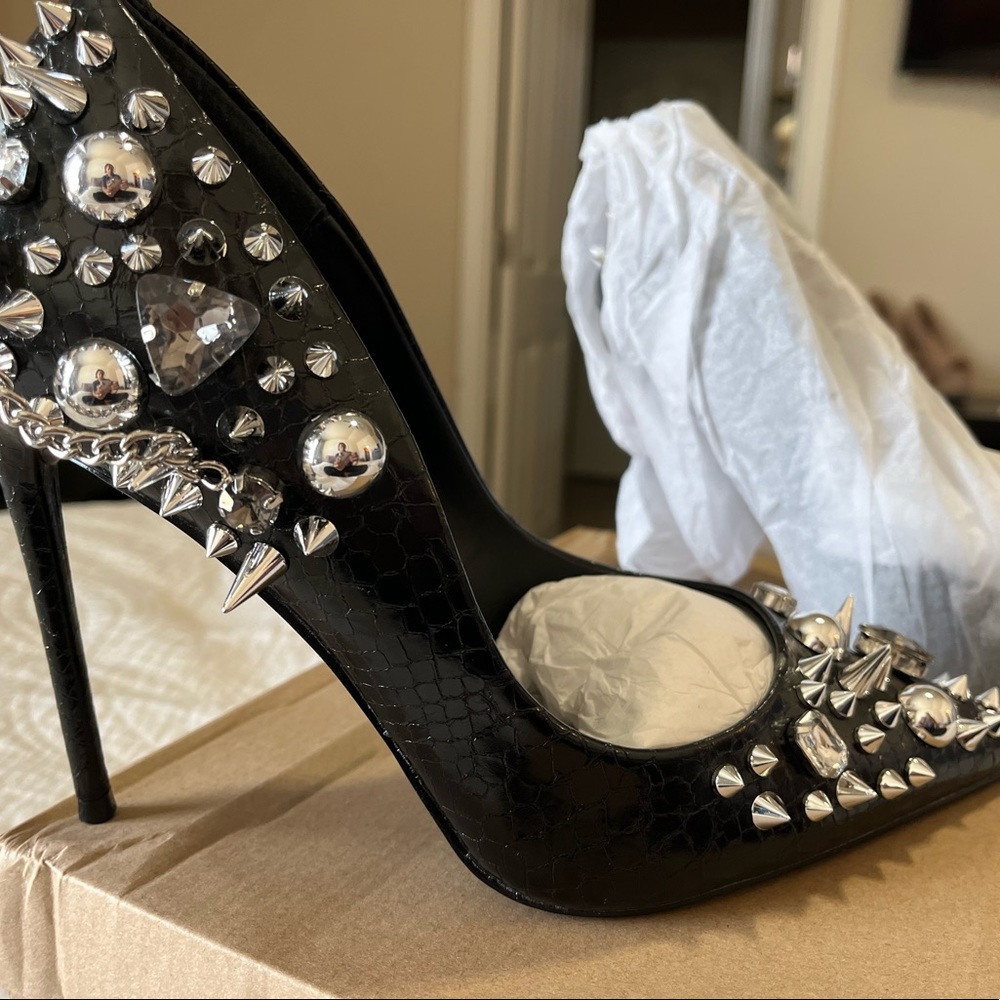 Steve Madden Veronicka black multi spike and rhinestone pumps.